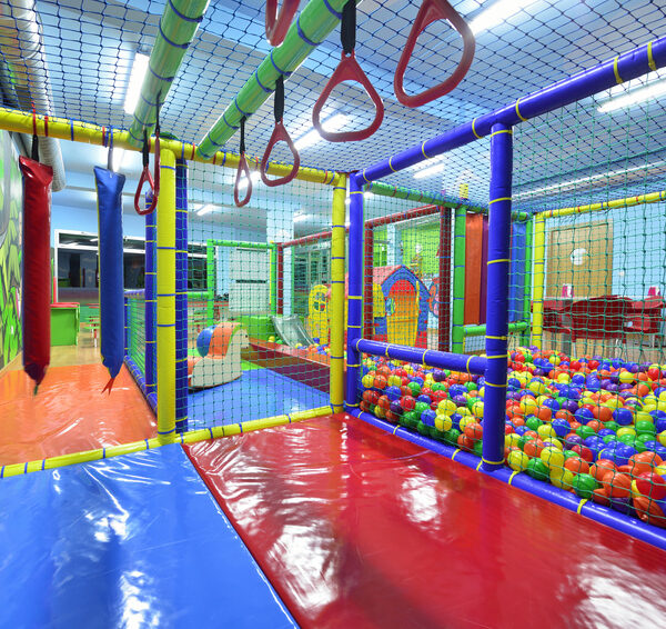 Go Play Systems Custom Design: ball room, monkey bars, padded floors, riding toys