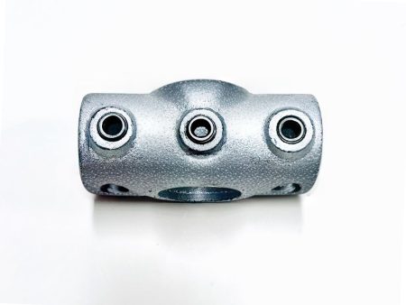 Accesorio de tuber&iacute;a pasante para estructuras de juegos infantiles interiores